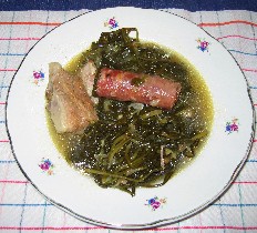 piatti tipici - Minestra di cicorie con carne di maiale