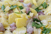 piatti tipici - Patate al forno con lampasciòni