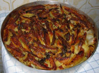 piatti tipici - patate al forno con lampasciòni e carne di agnello